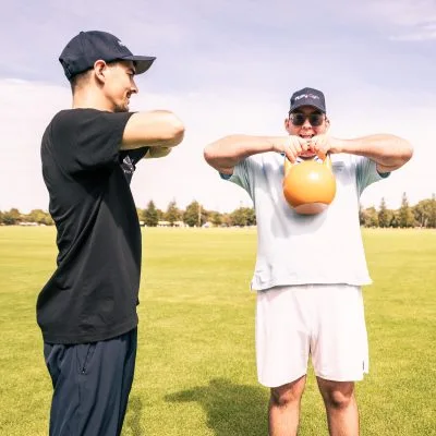 a person with a disability being trained by Marc from ability gym